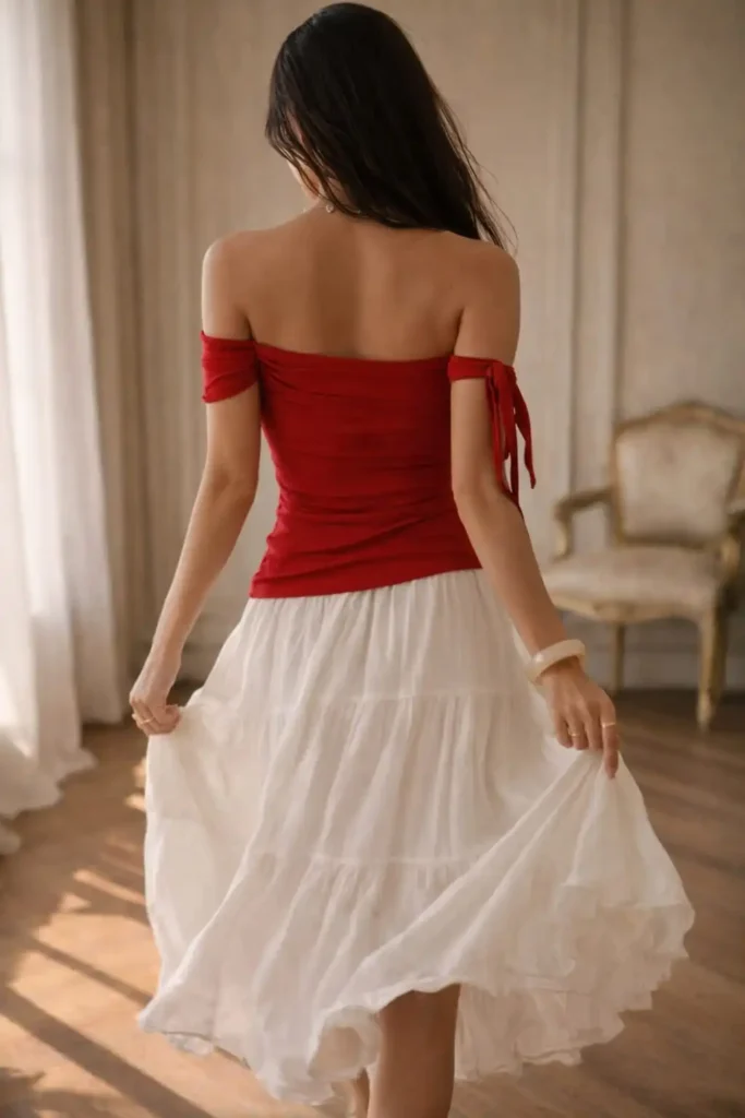 Red off shoulder tops for women styled with white skirt for elegant date night outfit