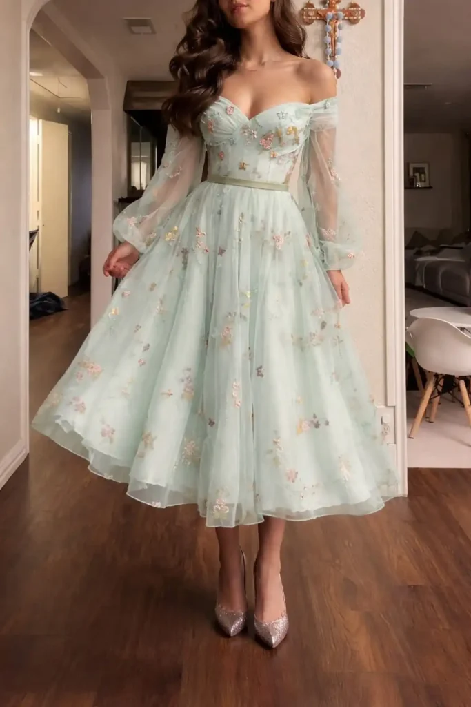 Mint green embroidered prom dress with off shoulder neckline and soft tulle skirt